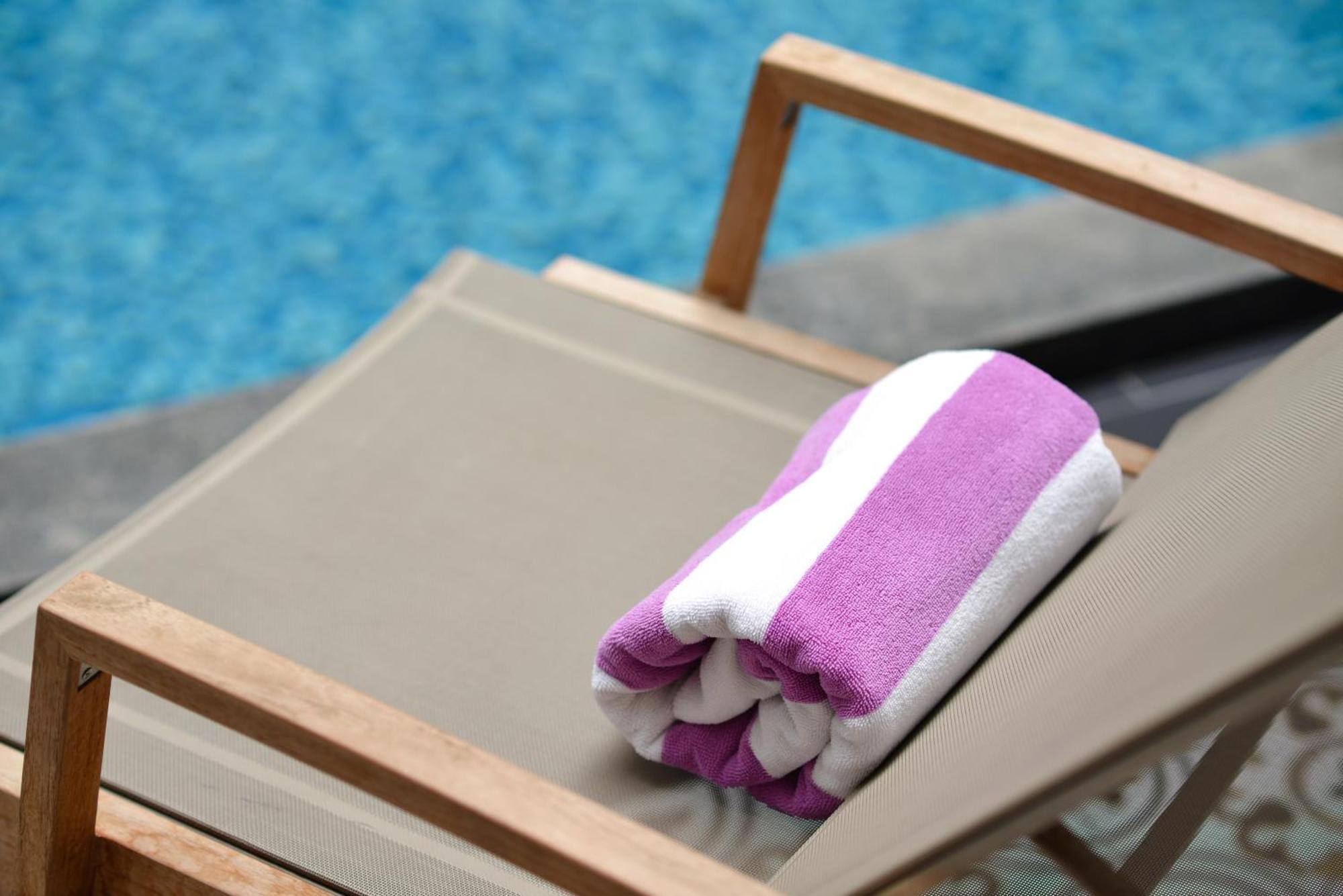 Villa De Pranakorn - Relais&Châteaux Banguecoque Exterior foto A pool towel